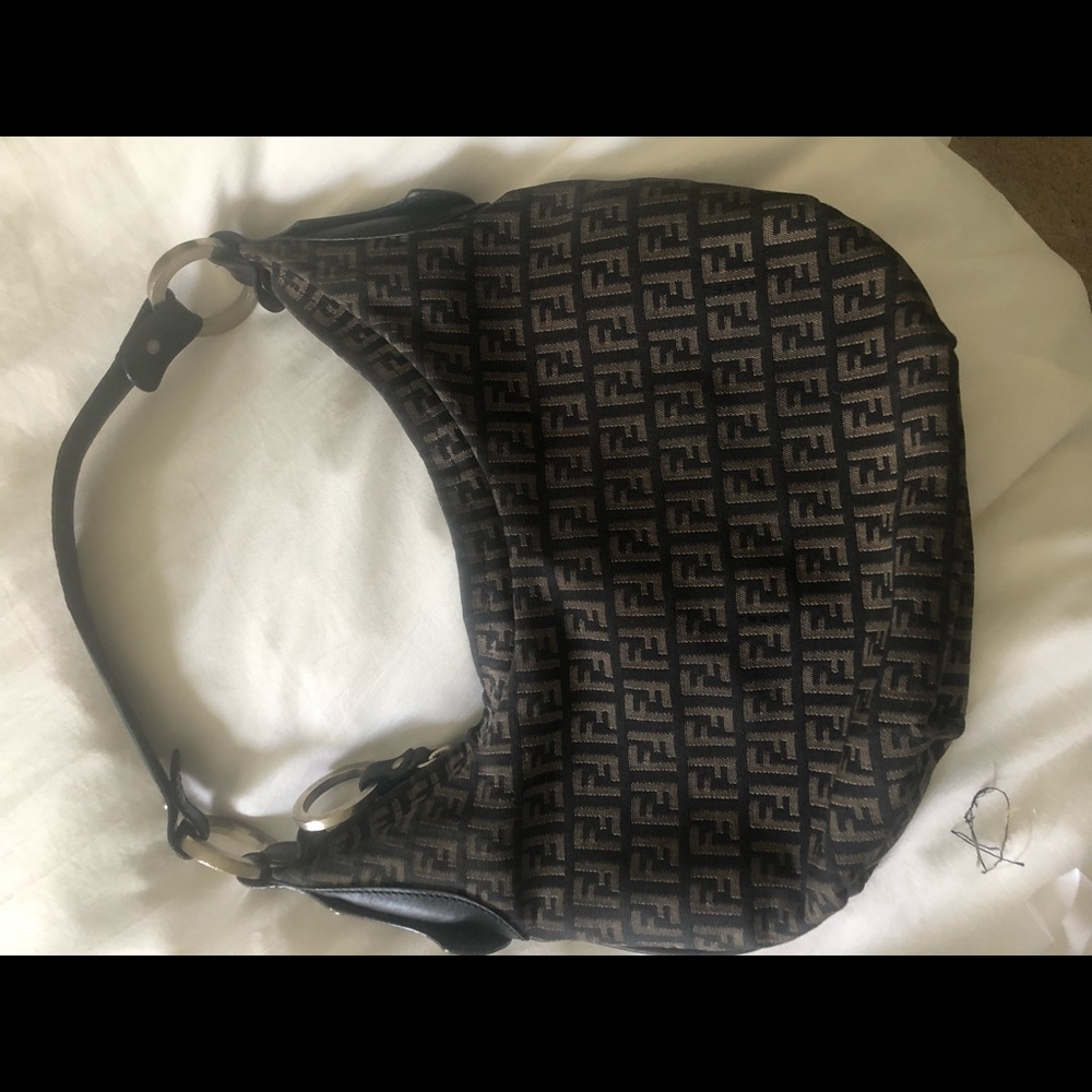 Authentic fendi bag. Old needs a cleaning.